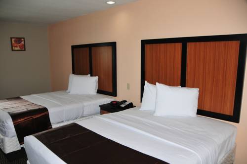 Imagen de la habitación del Hotel Paradise Inn and Suites, Baton Rouge. Foto 9