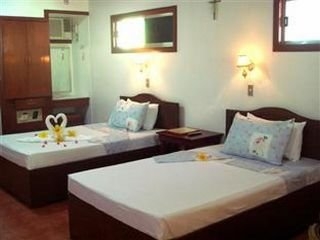 Imagen de la habitación del Hotel Paradise Island Park And Beach Resort. Foto 11