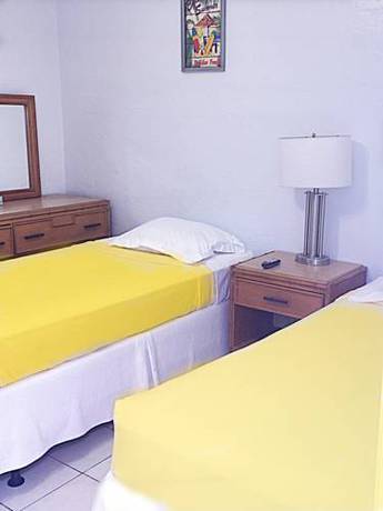 Imagen de la habitación del Hotel Paradise Oceanfront. Foto 13