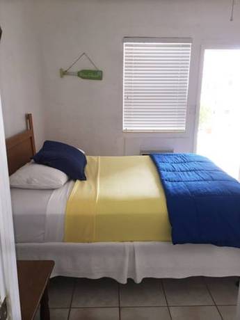 Imagen de la habitación del Hotel Paradise Oceanfront. Foto 15