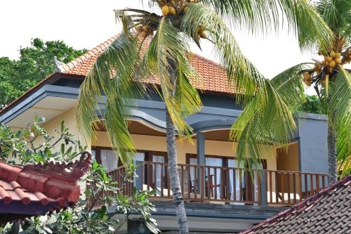 Imagen de la habitación del Hotel Paradise Palm Beach Bungalows And Dive Center. Foto 9