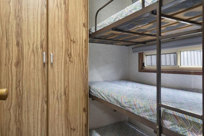 Imagen de la habitación del Hotel Paradise Palms Caravan park. Foto 6