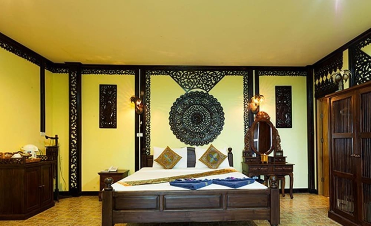 Imagen de la habitación del Hotel Paradise Pearl Bungalow. Foto 2