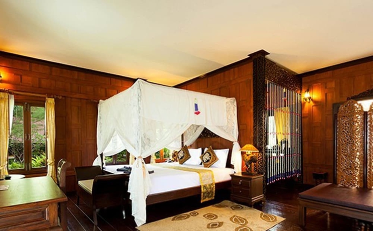 Imagen de la habitación del Hotel Paradise Pearl Bungalow. Foto 8