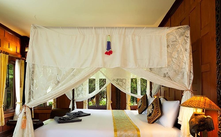 Imagen de la habitación del Hotel Paradise Pearl Bungalow. Foto 9