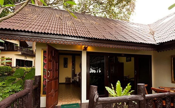 Imagen de la habitación del Hotel Paradise Pearl Bungalow. Foto 10