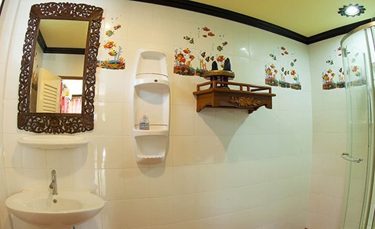 Imagen de la habitación del Hotel Paradise Pearl Bungalow. Foto 11