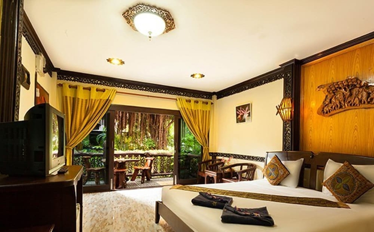 Imagen de la habitación del Hotel Paradise Pearl Bungalow. Foto 13