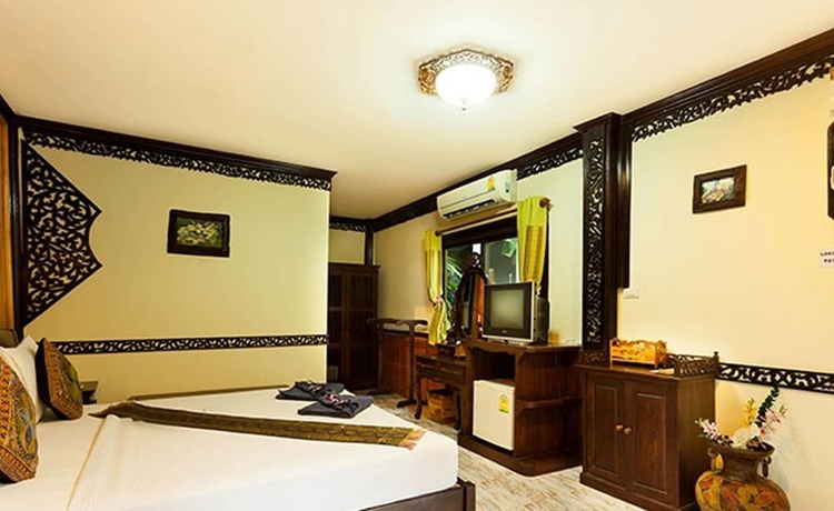Imagen de la habitación del Hotel Paradise Pearl Bungalow. Foto 14