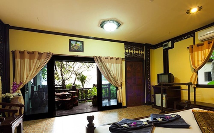 Imagen de la habitación del Hotel Paradise Pearl Bungalow. Foto 15
