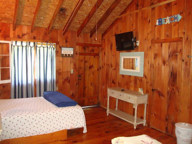 Imagen de la habitación del Hotel Paradise Resort and Cabins. Foto 10