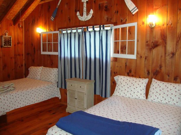 Imagen de la habitación del Hotel Paradise Resort and Cabins. Foto 13