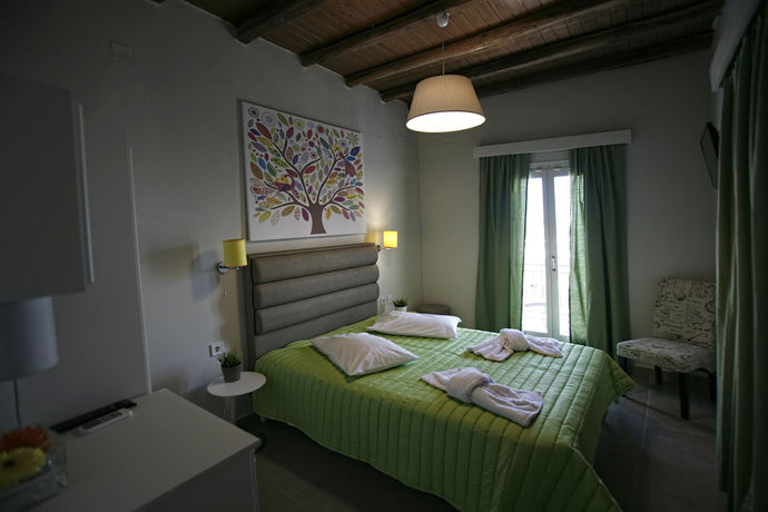 Imagen de la habitación del Hotel Paradise Rooms. Foto 15