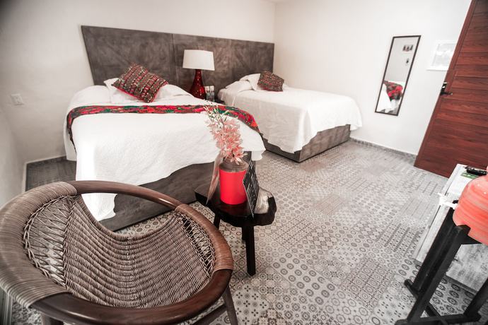 Imagen de la habitación del Hotel Paradise Suites, Isla Mujeres. Foto 12