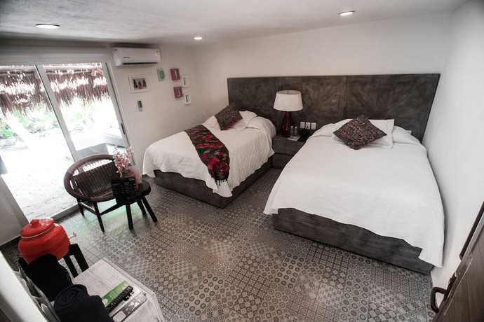 Imagen de la habitación del Hotel Paradise Suites, Isla Mujeres. Foto 16