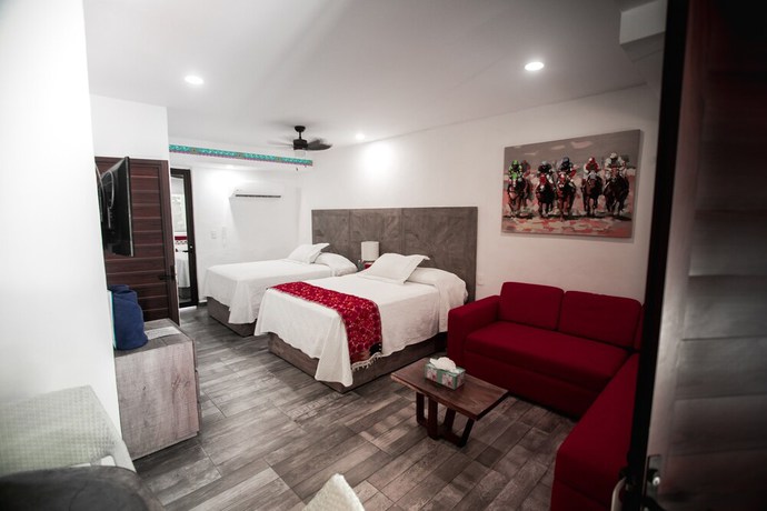 Imagen de la habitación del Hotel Paradise Suites, Isla Mujeres. Foto 17