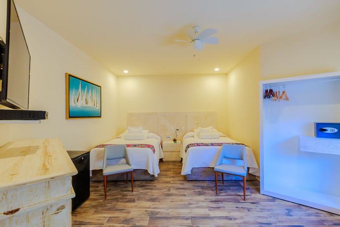 Imagen de la habitación del Hotel Paradise Suites, Isla Mujeres. Foto 19