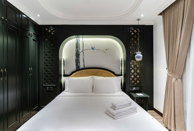 Imagen de la habitación del Hotel Paradise Suites Nguyen Khuyen. Foto 19