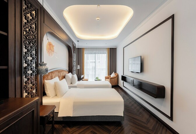 Imagen de la habitación del Hotel Paradise Suites Nguyen Khuyen. Foto 20