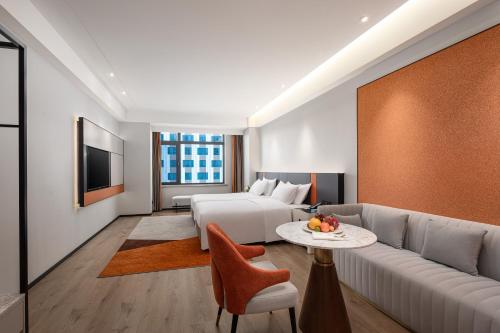 Imagen de la habitación del Hotel Paradiso Jiamusi. Foto 17