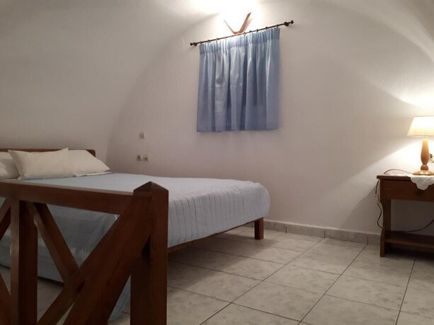 Imagen de la habitación del Hotel Paradisos Oia. Foto 19