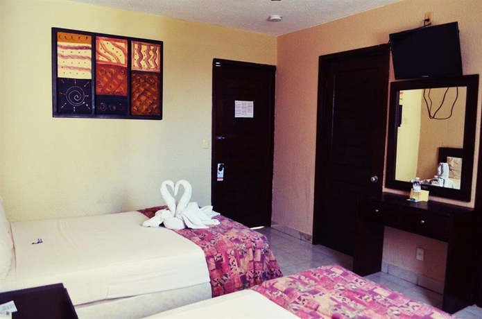 Imagen de la habitación del Hotel Parador, Cancún Centro. Foto 7