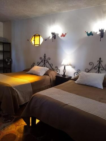 Imagen de la habitación del Hotel Parador Del Cortijo Spa. Foto 6