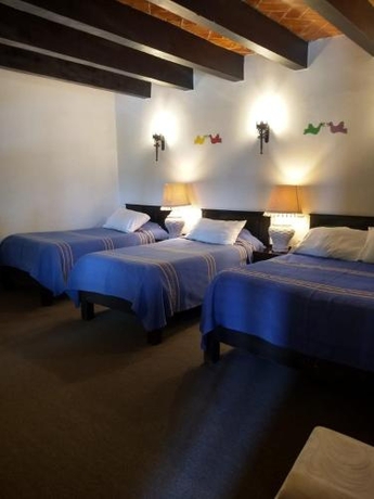 Imagen de la habitación del Hotel Parador Del Cortijo Spa. Foto 8