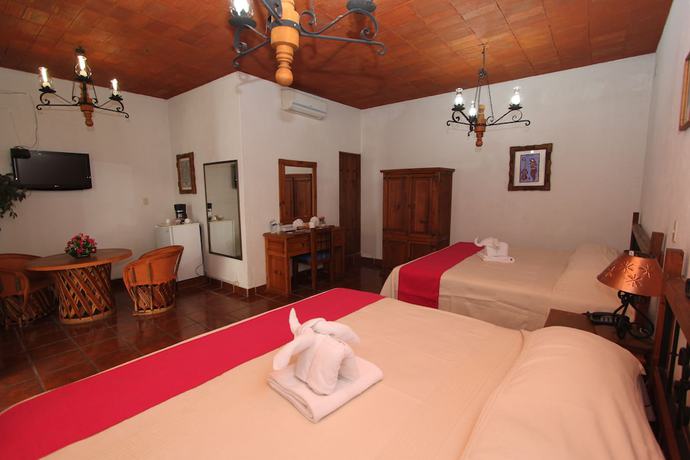 Imagen de la habitación del Hotel Parador Montecarmelo. Foto 14