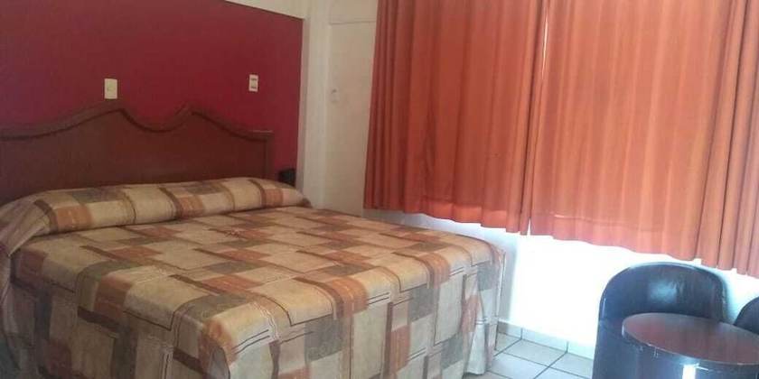 Imagen de la habitación del Hotel Parador del Rey. Foto 9