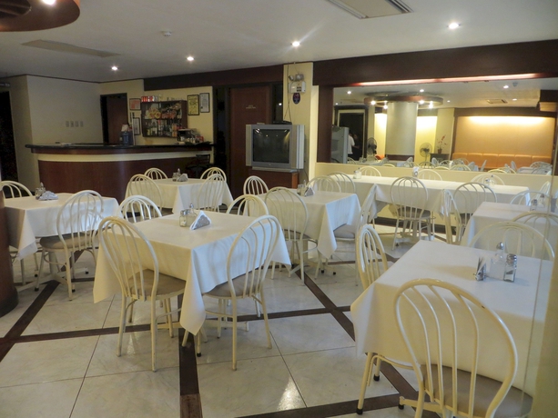 Imagen del bar/restaurante del Hotel Paragon Suites. Foto 1