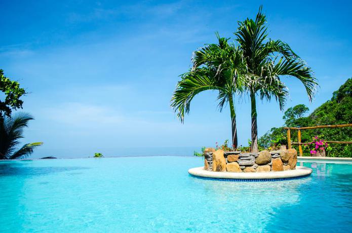 Imagen de la piscina del Hotel Paraiso Escondido Villas and Resort. Foto 11