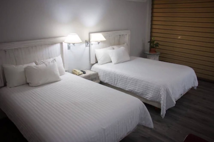 Imagen de la habitación del Hotel Paraiso Express. Foto 10