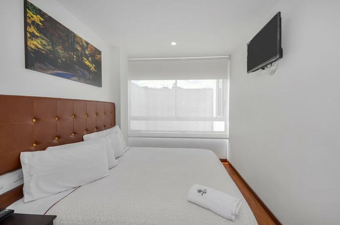 Imagen de la habitación del Hotel Paraiso Ferial. Foto 16
