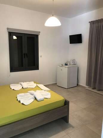 Imagen de la habitación del Hotel Paralia Rooms. Foto 14