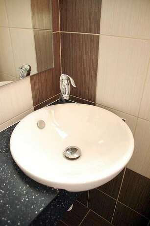 Imagen de la habitación del Hotel Paralia Rooms. Foto 18
