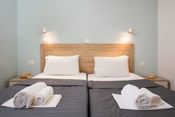 Imagen de la habitación del Hotel Paralia Studios. Foto 17