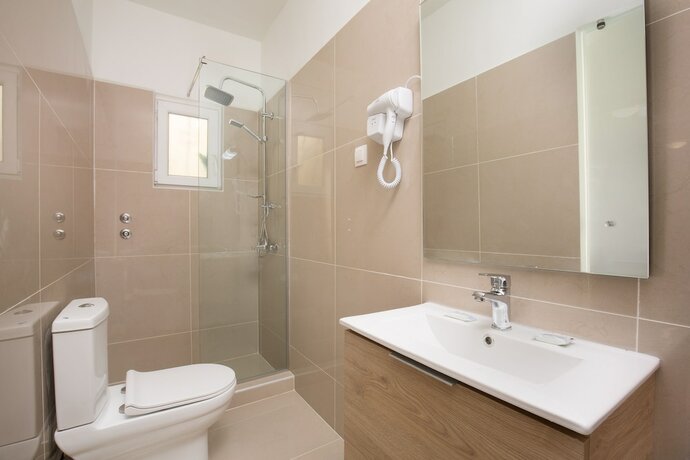 Imagen de la habitación del Hotel Paralia Studios. Foto 19