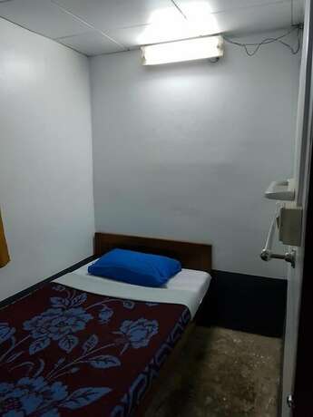 Imagen de la habitación del Hotel Parami Motel. Foto 17