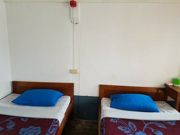 Imagen de la habitación del Hotel Parami Motel. Foto 18