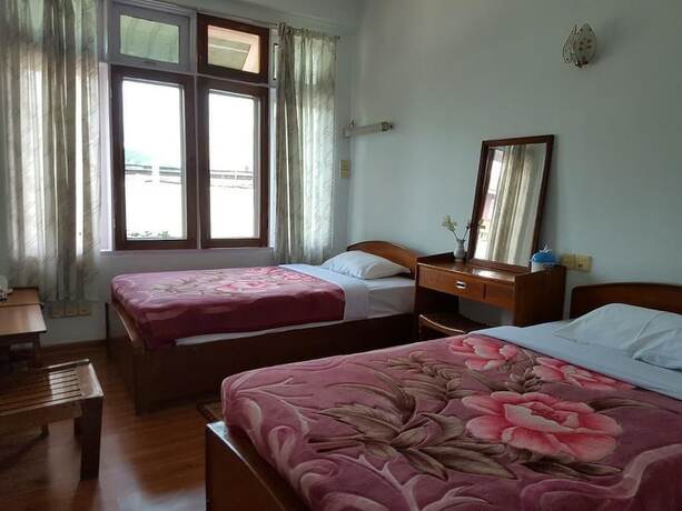 Imagen de la habitación del Hotel Parami Motel. Foto 20