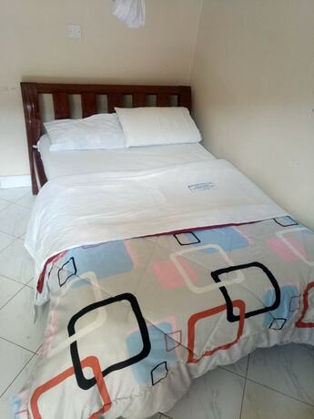Imagen de la habitación del Hotel Paramount Guest House, Gilgil. Foto 11