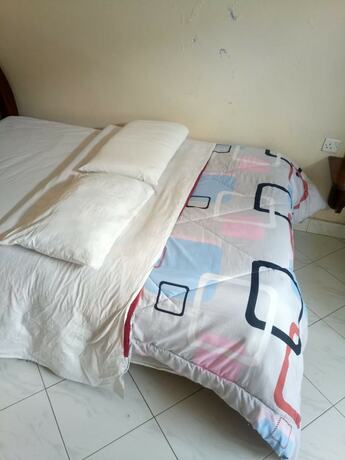 Imagen de la habitación del Hotel Paramount Guest House, Gilgil. Foto 12