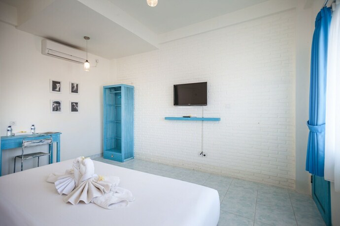 Imagen de la habitación del Hotel Paras Paros Marina Lodge. Foto 30