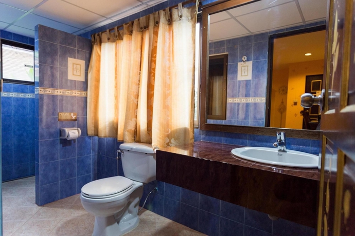 Imagen de la habitación del Hotel Parasol Inn Chiang Mai Old City. Foto 4