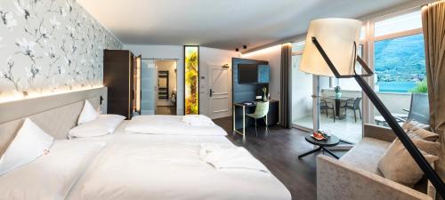 Imagen de la habitación del Hotel Parc Am See, Campi al Lago. Foto 8