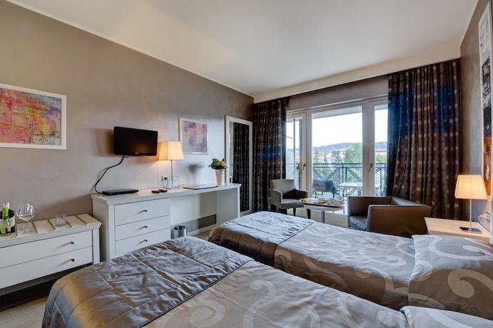 Imagen de la habitación del Hotel Parc Gritti. Foto 19