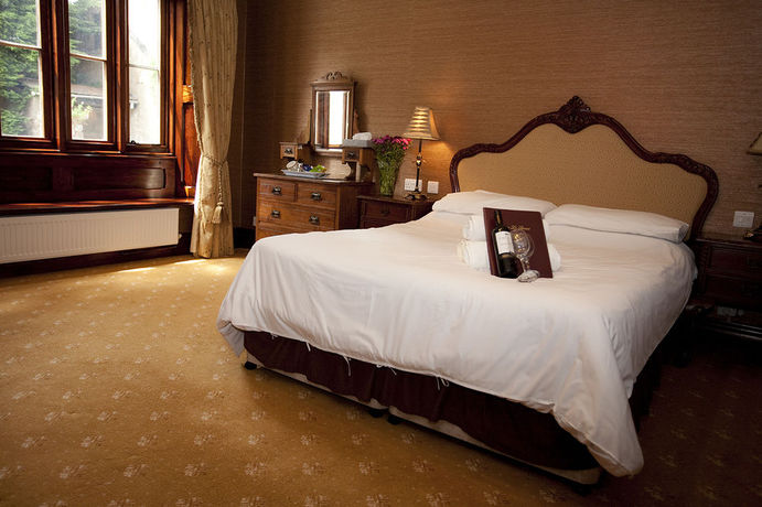 Imagen de la habitación del Hotel Parc Le Breos House. Foto 7