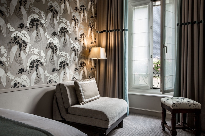 Imagen de la habitación del Hotel Parc Saint Severin. Foto 15