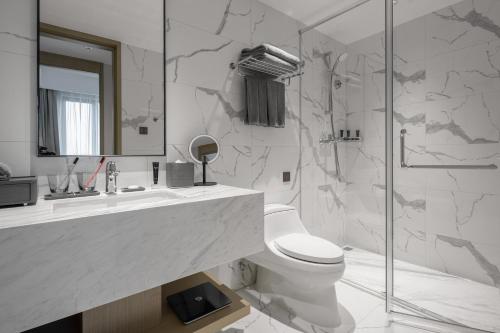 Imagen de la habitación del Hotel ParcVue Residence Nanjing. Foto 18